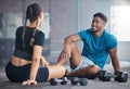 Fitness, exercise and couple talking after gym. workout while on floor for communication and conversation about health Royalty Free Stock Photo