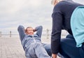 Fitness, exercise and sit ups with a senior couple training outdoor together for an active lifestyle of wellness Royalty Free Stock Photo