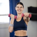 Fitness, exercise and woman doing weight lifting in gym for healthy lifestyle, wellness and cardio. Sports, dumbells and Royalty Free Stock Photo