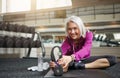 Fitness fanatic in her fifties. a mature woman working out at the gym.