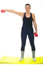 Fitness female with red barbell Royalty Free Stock Photo