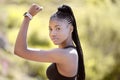 Fitness, flexing and black woman with muscle in nature ready for arms training, biceps and outdoor workout in summer Royalty Free Stock Photo