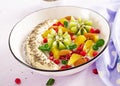 Delicious and healthy chia pudding with banana, kiwi and chia seeds.