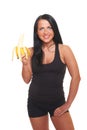 Fitness girl with banana isolated on white Royalty Free Stock Photo