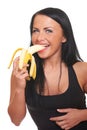 Fitness girl with banana isolated on white Royalty Free Stock Photo