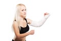 Fitness girl with a broken arm Royalty Free Stock Photo