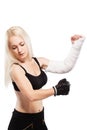 Fitness girl with a broken arm