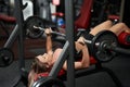 Fitness girl doing incline bench press Royalty Free Stock Photo