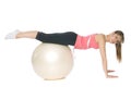 Fitness girl doing pilates with a ball Royalty Free Stock Photo