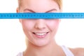 Fitness girl fit woman covering her eyes with measuring tape Royalty Free Stock Photo