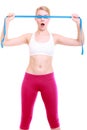 Fitness girl fit woman covering her eyes with measuring tape Royalty Free Stock Photo