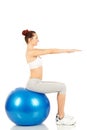 Fitness girl holding exercising ball