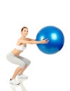 Fitness girl holding exercising ball