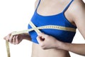 Fitness girl measured her breast Royalty Free Stock Photo