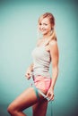 Fitness girl measuring her thigh Royalty Free Stock Photo