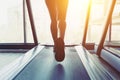 Fitness girl running on treadmill Royalty Free Stock Photo