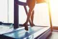 Fitness girl running on treadmill Royalty Free Stock Photo