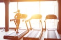 Fitness girl running on treadmill Royalty Free Stock Photo