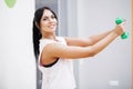 Fitness Girl. Sexy athletic girl working out in gym. Fitness woman doing exercise Royalty Free Stock Photo