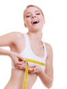 Fitness girl sporty woman measuring her bust size isolated