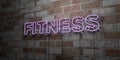 FITNESS - Glowing Neon Sign on stonework wall - 3D rendered royalty free stock illustration