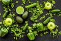 Fitness greeny drink with vegetables on dark background top view mock-up Royalty Free Stock Photo