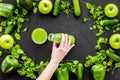 Fitness greeny drink with vegetables on dark background top view mock-up Royalty Free Stock Photo