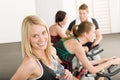 Fitness group of people on gym bike Royalty Free Stock Photo