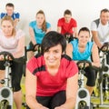 Fitness group of people on gym bike Royalty Free Stock Photo