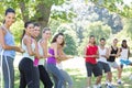 Fitness group playing tug of war Royalty Free Stock Photo