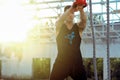 Fitness guy workout with a kettlebell outdoor
