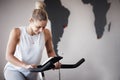 Fitness, gym bike and woman cycling for cardio performance, body wellness and exercise mockup. Health goals, spin Royalty Free Stock Photo