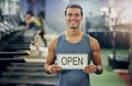 Fitness, gym and owner open sign portrait with smile of man for professional fitness, training and management. Workout