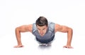 Fitness handsome man doing push ups