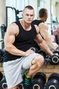 Fitness. Handsome man in the gym