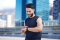 Fitness, happy man and smart watch time for marathon running, exercise workout and healthy urban city training. Sports Royalty Free Stock Photo
