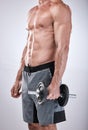 Fitness, health or man with a dumbbell in hand for exercise, training or gym workout for body goals. Sports motivation Royalty Free Stock Photo