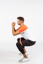 Fitness, health and sport concept. Vertical full-length studio shot active good-looking male athlete, football player in