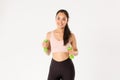 Fitness, healthy lifestyle and wellbeing concept. Portrait of happy slim and strong asian female athlete, sportswoman in