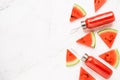 Fitness, healthy nutrition diet concept. Fresh cool watermelon juice in a glass jar and watermelon slices on a light background. Royalty Free Stock Photo