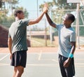 Fitness, high five and men on a basketball court for a game, practice or training together. Happy, celebration and male