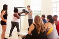 Fitness Instructor In Exercise Class For Overweight People Royalty Free Stock Photo