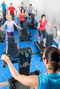 Fitness instructor leading treadmill running class Royalty Free Stock Photo