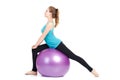 Fitness instructor,shows exercises with a large ball. Royalty Free Stock Photo