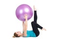 Fitness instructor,shows exercises with a large ball. Royalty Free Stock Photo