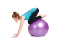 Fitness instructor,shows exercises with a large ball. Royalty Free Stock Photo