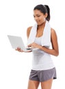 Fitness, internet and woman with a laptop, healthy and towel isolated on white studio background. Person, girl or model