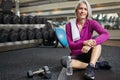 Fitness keeps me feeling young and healthy. Portrait of a mature woman working out at the gym. Royalty Free Stock Photo