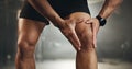 Fitness, knee pain and hands of man at gym for training with muscle, problem or arthritis. Sports, injury and leg of