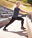 Fitness, legs and portrait of man stretching at stadium for race, marathon or competition training. Sports, health and Royalty Free Stock Photo